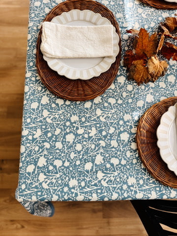 Blue Thistle Tablecloth styled on a coastal dining table set for entertaining