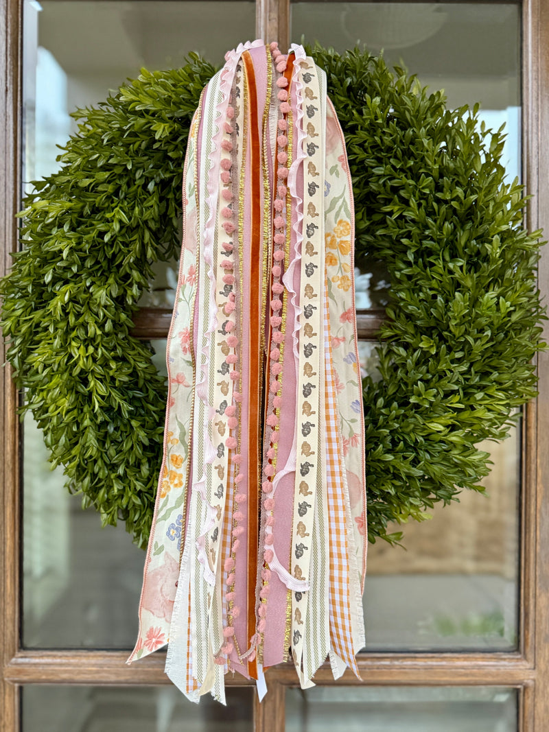Blush Meadow Long 27 ribbon cascading from a spring front door wreath