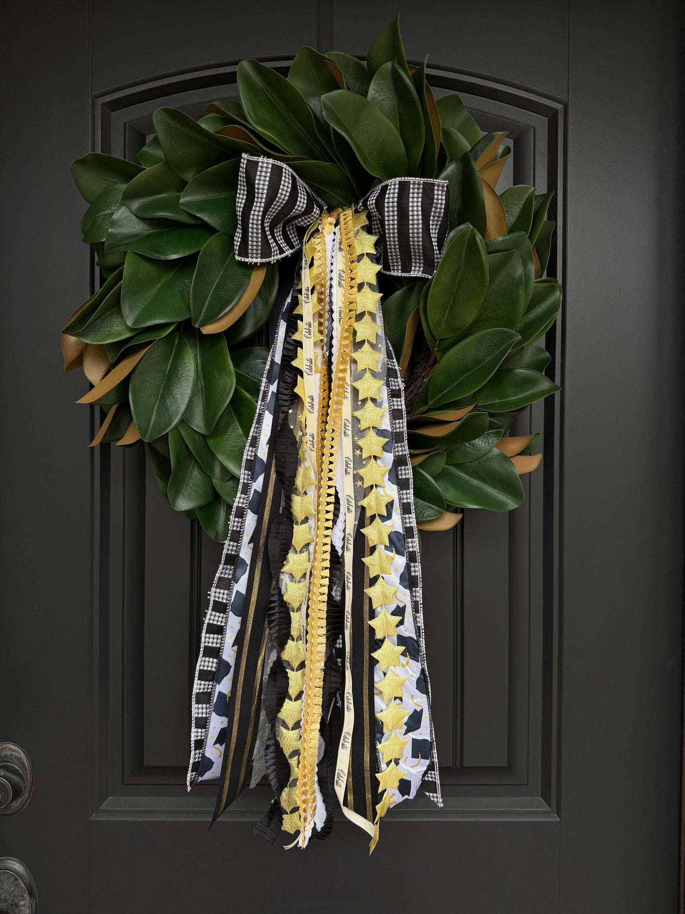 Graduation Designer Bow in black, gold, and ivory on front door wreath by House of Turnberry